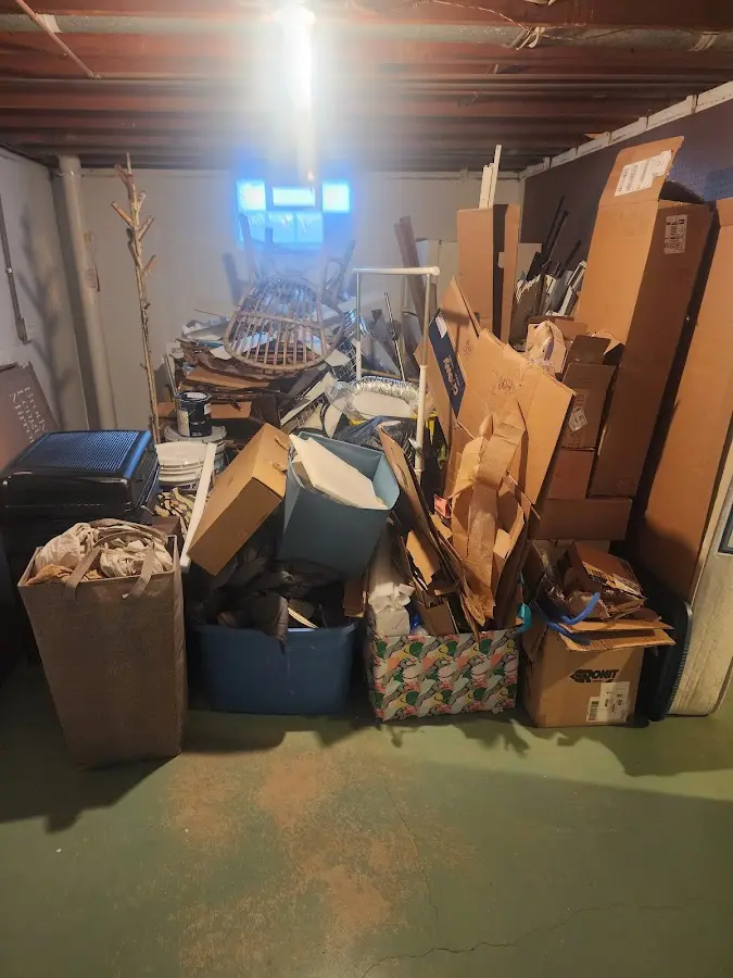 Roll-off dumpster container at job site for 2 Yard Dumpster Rental in Litchfield